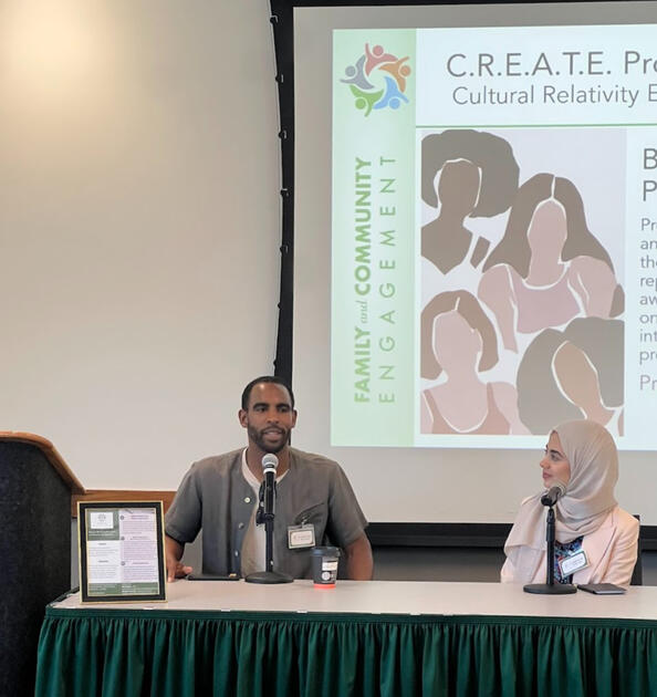 Jordan Brown headshot with light blue background