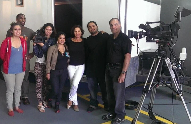 Jordan Brown headshot with light blue background